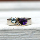 Bague vintage avec zircone violette en forme de goutte