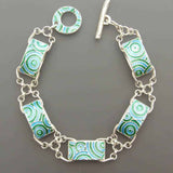 Bracelet vintage en argent tressé et émaillé