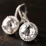 Boucles d'oreilles rondes vintage en verre