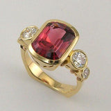 Bague vintage en or avec zircone et verre rouge