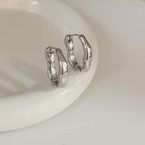 Boucles d'oreilles vintage irrégulières en or et argent
