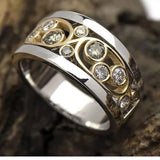 Bague vintage en or et argent avec zircone et motif lierre