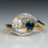 Bague vintage en or avec zircone bleue et blanche ondulée