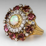 Bague vintage en or avec opale blanche, grenat et zircone