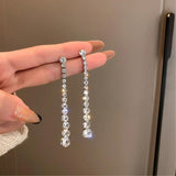 Boucles d'Oreilles Pendantes en Zircone