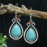 Boucles d'oreilles bohèmes en argent et opale