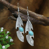 Boucles d'oreilles bohèmes en argent avec opale