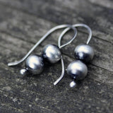 Boucles d'oreilles bohèmes en argent et perles