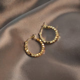 Boucles d'Oreilles Élégantes en Or et Cubes