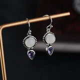 Boucles d'oreilles vintage en cristal violet et pierre de lune