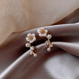 Boucles d'oreilles fleurs et perles