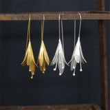 Boucles d'oreilles vintage en or et argent avec motif lotus