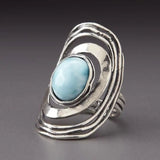 Bague vintage spirale en pierre incrustée bleue