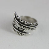 Bague vintage ouverte en argent avec plume