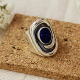 Bague vintage en argent avec pierre incrustée foncée
