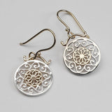 Boucles d'oreilles vintage à symbole arrondi