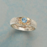Bague vintage en argent avec fleur en zircone bleue