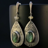 Boucles d'oreilles vintage avec pierres incrustées vertes
