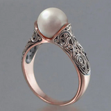 Bague vintage en or rose et perle