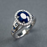 Bague vintage en argent avec zircone ronde incrustée de bleu