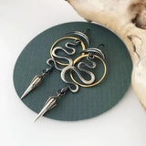 Boucles d'oreilles géométriques irrégulières en spirale Serpentine