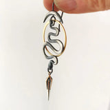 Boucles d'oreilles géométriques irrégulières en spirale Serpentine