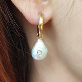 Boucles d'oreilles vintage en perles baroques et zircone
