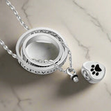 « Plus à mes côtés, mais pour toujours dans mon cœur » – Collier avec urne en acier inoxydable et pendentif en forme de patte