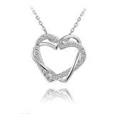 Collier et boucles d'oreilles en diamant en forme de cœur