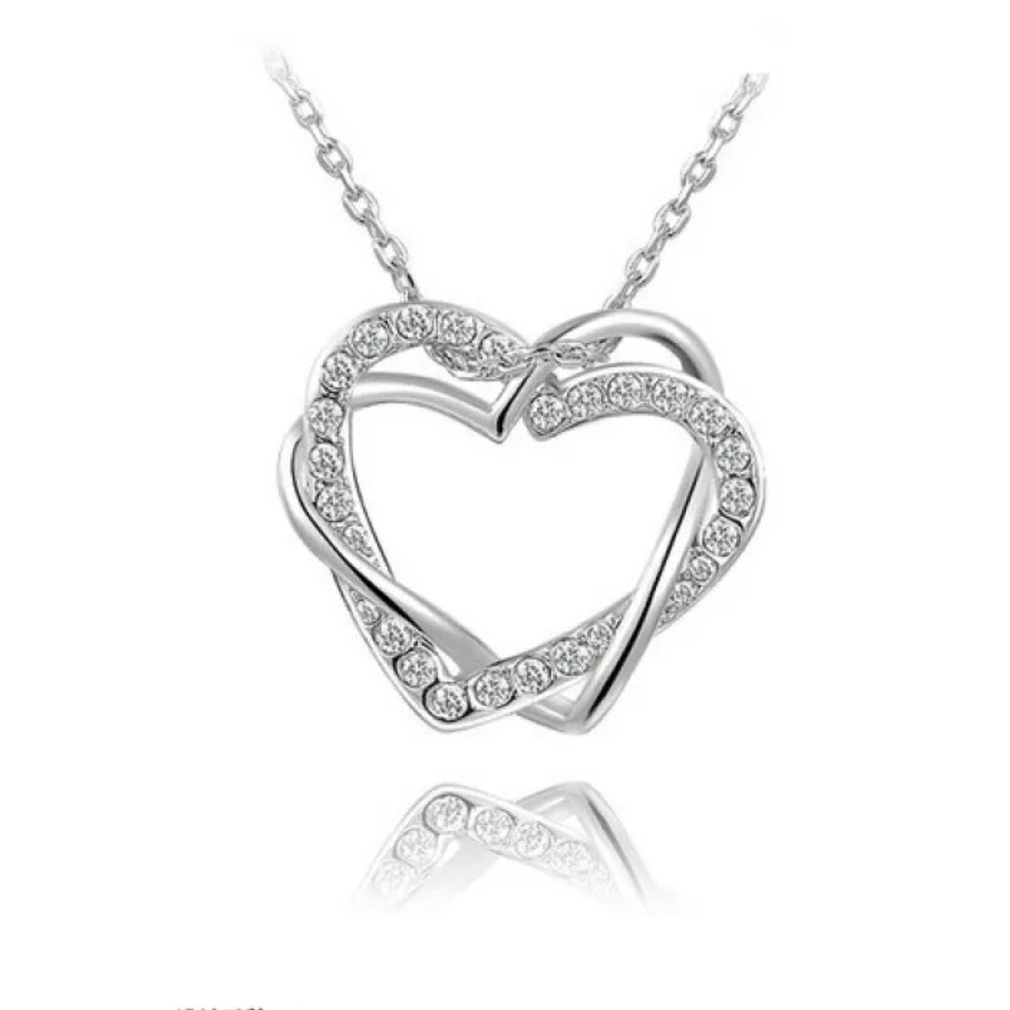 Collier et boucles d'oreilles en diamant en forme de cœur