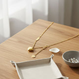 Collier pendentif cœur multicouche