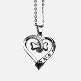 Collier avec empreinte de patte de chien et cœur en acier inoxydable