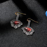 Boucles d'oreilles Irrégulières en Argent avec Pierres Rouges