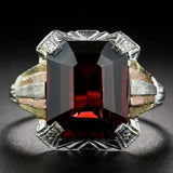 Bague vintage en or et argent avec zircone rouge