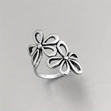 Bague vintage en argent creux en forme de fleur