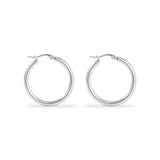 Boucles d'oreilles™ | Créoles en argent poli, élégance