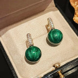 Boucles d'oreilles en perles vertes et or