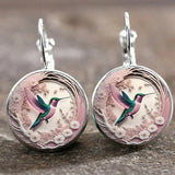 Collier pendentif colibri sous cloche en verre