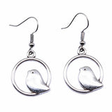 Boucles d'oreilles pendantes vintage avec pendentif oiseau – Bijoux bohèmes faits main