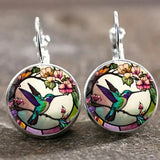 Collier pendentif colibri sous cloche en verre