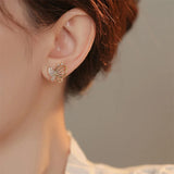 Élégantes boucles d'oreilles papillon en zircon