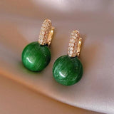 Boucles d'oreilles en perles vertes et or
