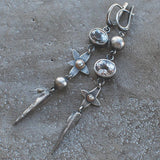 Boucles d'oreilles pendantes étoile en strass