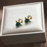 Boucles d'oreilles festives en cristal en forme de renne