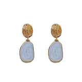 Boucles Ovales™ | Élégance en émail vintage