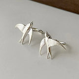 Magnifiques boucles d'oreilles à clip en forme d'hirondelle argentée