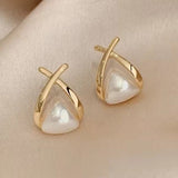 Boucles d'oreilles Croix™ | Élégance vintage avec perles