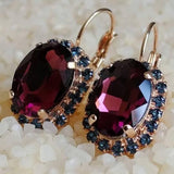 Boucles d'oreilles vintage en zircone bleue grenat