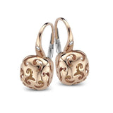 Boucles d'oreilles vintage creuses en or brillant