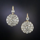 Boucles d'oreilles vintage arrondies brillantes